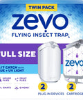 Plug In Flying Insect Trap For Fruit Flies And Gnats Using Blue And Uv Light With Zero Mess Adhesive Cartridge To Keep Your Spot Bug Free Includes two white plug-in devices and two cartridges in a twin pack.