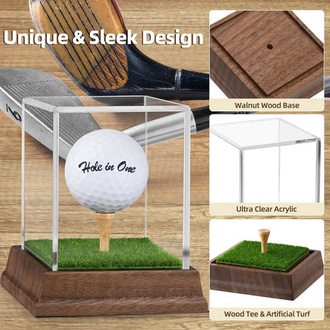 Hole In One Golf Ball Display Case With Realistic Turf Base And Walnut Wood Stand Clear Acrylic Box shown with golf club backdrop