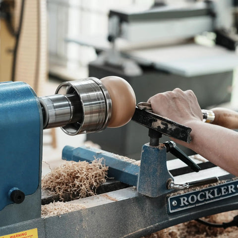 Woodworker using lathe spindle adapter for woodworking converts one and a quarter inch 8TPI female to one inch 8TPI male external threads