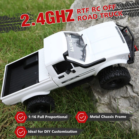 Rugged All Terrain 4x4 RC Crawler Truck 1 Sixteenth Scale Remote Control Pickup RTR Off Road Toy Car For Adults Durable Battle Ready Offroad Beast In White Finish climbing rock terrain showing 2.4GHz features.