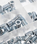 Close-up of zinc-plated iron inserts from Threaded Inserts Kit For Wood Projects 100 Pieces Beefy Zinc Plated Iron Fasteners