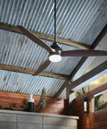 72 Inch Indoor And Outdoor Smart Ceiling Fan With Integrated Led Light and Smart Remote featuring driftwood blades in modern patio.