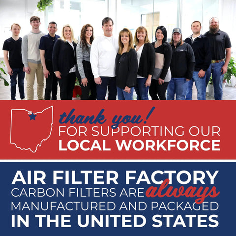 Group of employees standing with thank you message for supporting local workforce, highlighting USA-made carbon filters