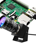 Low Light USB Camera With 5-50mm Manual Zoom And 10x Varifocal Lens, HDR 100dB, H.264 WebCam shown beside circuit board