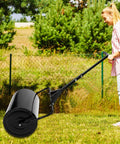 Person using Heavy Duty Lawn Roller For Push Or Tow, Water And Sand Filled Garden Drum Roller, Durable Iron Frame, 10 Gallons Capacity.