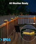 Give Your Yard A Sweet Glow With These Tough Black Solar Post Cap Lights For 4X4 Fence Boards Weatherproof Dusk Till Dawn Outdoor Deck Lamps Zero Wires Hook And Go on a rainy deck.