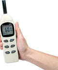 Hand holding Must Have Pro Grade Digital Sound Level Meter For Worksites And Audio Installations 40 To 130 dB Range With 2 dB Accuracy