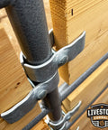 Heavy Duty Galvanized Horse Panel Clamps Fit 1 5 8 Inch Livestock Corral Fencing Attaches Wood Boards To Round Pens And Stall Walls No Weld Barn Setup Quick No Sweat Install 8 Pack close-up view of clamp securing wooden board to round pen.