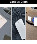 Top Rated 5000 Piece Plastic Tagging Gun Fasteners 0.5 Inch White Barbs on various clothing items for retail tagging.
