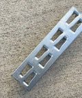 Built Tough Hot Dipped Galvanized Steel Mending Plates For Wood Deck Repair And Framing Reinforcement 1 Inch By 4 Inches on concrete.