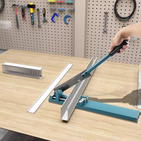 Manual Wire Duct Cutter For PVC Trunking And Open Slot Ducts in use on a workbench, blue handle, cutting duct with sharp burr-free blade.