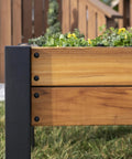 Side view of Teak Wood Raised Garden Bed Planter Box With Galvanized Steel Legs And Mesh Liner For Outdoor Gardening on grass