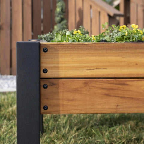 Side view of Teak Wood Raised Garden Bed Planter Box With Galvanized Steel Legs And Mesh Liner For Outdoor Gardening on grass