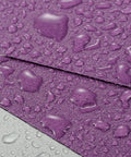 Close-up of 600 Grit Wet Dry Sanding Sheets 9 By 11 Inch Set White Fused Alumina Abrasive Pro Grade for finishing with water droplets