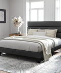 Queen Platform Bed Frame Built From Heavy Duty Metal And Solid Wood Features A Padded Upholstered Headboard For Quiet Nights Rock Solid Structure Handles Eight Hundred Pounds Protects Floors With Rubber Feet Built Tough For Casual Weekend Kickbacks in a modern bedroom setting.