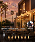 100Ft Outdoor String Lights With Remote Dimmable And Connectable Warm White LED Patio Lighting For Backyard Porch Deck Or Balcony Weatherproof Shatterproof Bulbs Three Modes And Memory Function Totally Lit displayed on a patio with sunset view.