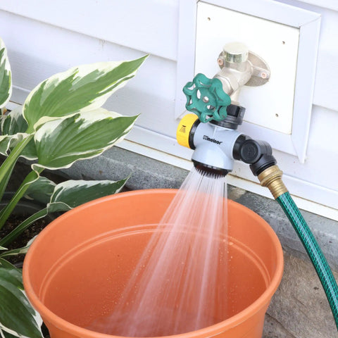 Relaxgrip Gardening Nozzle And Wash And Fill Set With No Squeeze Thumb Control And Arthritis Friendly Handles in use with orange bucket
