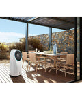 White Portable Evaporative Cooler That Delivers Legit Indoor Cooling And Natural Humidification While Skipping The Heavy Compressor For Straight Up Energy Savings And Fresher Air Anytime near outdoor dining area.