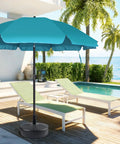 Poolside patio with green loungers and an umbrella supported by Heavy Duty Steel Umbrella Base Tube Replacement Pole With Black Powder Coat.