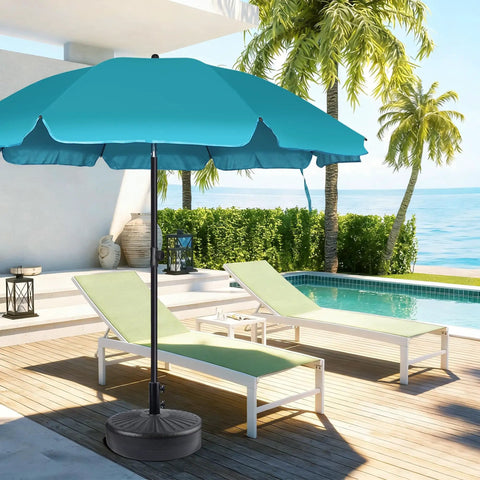 Poolside patio with green loungers and an umbrella supported by Heavy Duty Steel Umbrella Base Tube Replacement Pole With Black Powder Coat.