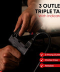 Close-up of hands holding 3-outlet triple tap with indicator for Retractable Extension Cord Reel With 30 Ft 16 AWG Cord 3 Outlets 180 Degree Swivel Mount