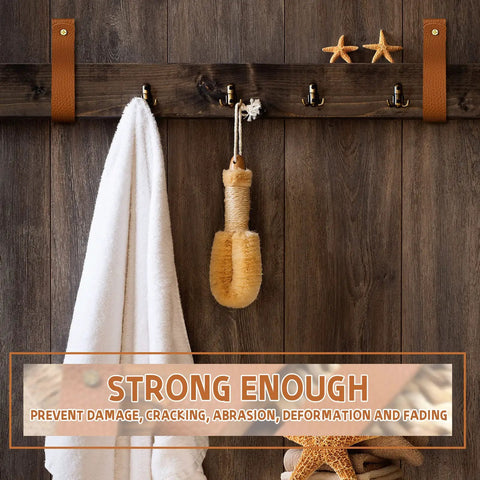 8 Piece Hella Durable Premium Leather Wall Hooks With Solid Brass Screws For Heavy Duty Curtain Hanging And Super Slick Bathroom Storage Essentials, displaying white towel and bath brush on wooden wall.