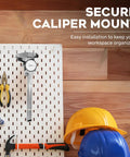 Heavy Duty Wall Mount For 6 Inch Digital Vernier And Dial Calipers installed on pegboard with tools and safety gear nearby.