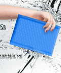 Hand holding Blue Waterproof Bubble Mailers 4x8 Self Seal Adhesive Shipping Bags with cushioned padded envelopes for mailing