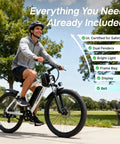 Smiling rider on OUREA 26 Electric Bike For Adults, 750W Peak Motor All Terrain Ebike on park path, trees and bench in background.