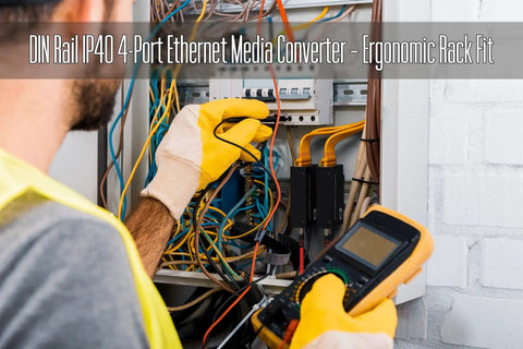 Technician installing a Multimode Fiber Media Converter And Gigabit Switch with DIN rail mount in a control cabinet.