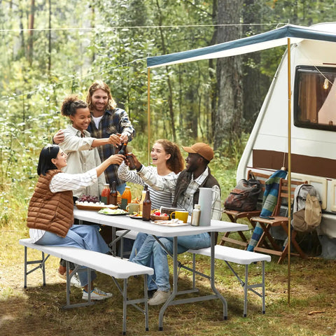 Group enjoying outdoors around a Six Foot Picnic Table Set With Two Benches, Three Piece Folding Outdoor Table And Chair Set
