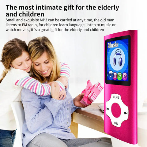 Portable MP3 Player With 1.8 Inch LCD Screen Video And Voice Recording FM Radio Ebook And Photo Viewer Expandable To 64GB Pink shown near family gifting scene.