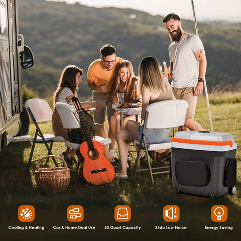 32 Quart Electric Car Cooler Warmer With Smooth Rolling Wheels Keeps Food And Drinks Ice Cold at a camping gathering with friends.