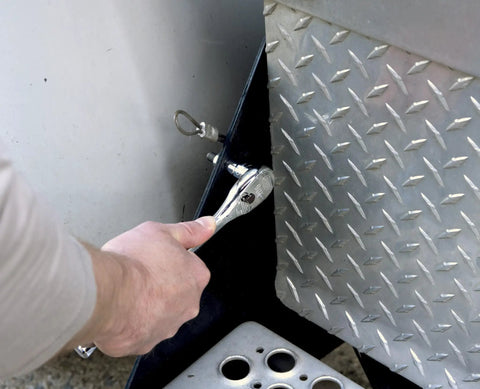 Using a ratchet from 57 Piece Three Eighth Inch Drive Six Point Mechanics Tool Set With Standard And Deep Sockets SAE Metric 90 Tooth Gear