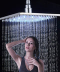 Person enjoying High Pressure Universal Rain Shower Head With LED Chrome Square Design 16 Inch Rainfall Waterfall Showerhead
