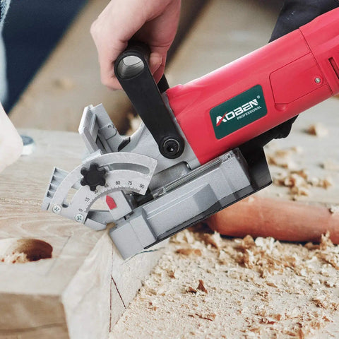 8.5 Amp Biscuit Cutter Plate Joiner Kit cutting wood, showing 4 inch tungsten carbide blade for corner miter and butt joints