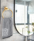 Slick Wall Mounted Towel Ring Crafted From Premium Stainless Steel Tailored For Top Shelf Bathrooms And Kitchens Boasts A Butter Smooth Swivel Handle With Quick Screw Install That Totally Slaps Against Tile Work with grey towel.