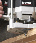 Badass 30 Piece Router Bit Starter Kit One Quarter Inch Shank Tungsten Carbide Tipped Bits Rock Solid Aluminum Case Included Universal Guided Cutters For Smooth Woodworking in use with a router on wood.