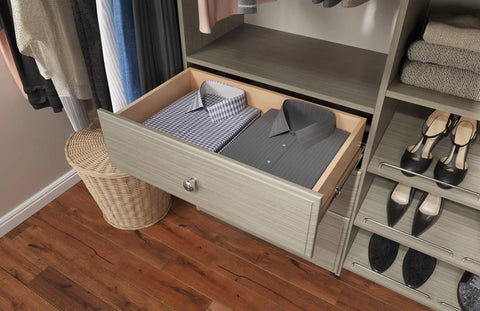 Rock Solid Dual Tower Closet Organizer Kit With Weathered Grey Finish and Slick Wall Mounted Steel Rail System Featuring Game Changing Drawers for Effortless Home Organization and No Fuss Assembly with neatly folded shirts.