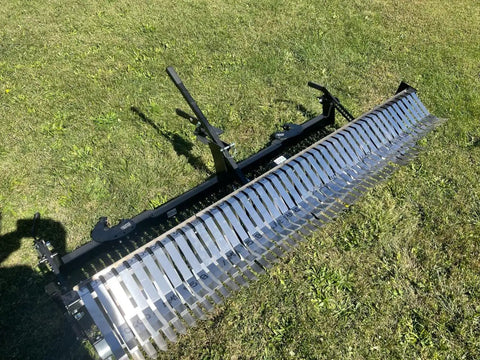 Zero Turn Mower Rake Attachment For Leaves Walnuts Gravel Acorns Grass And More Swinging Toolbar Rake Mounts On Your Black Zero Turn Mower Beefy Yard Cleanup Tool That Makes Debris Pickup A Breeze