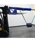 Heavy Duty Orbital Telescoping Boom Lift 4000 Pound Capacity with fork and material suspended in warehouse setting.