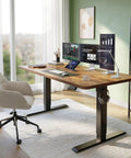 Rustic Brown 55 By 24 Inch Electric Standing Desk With Smooth Height Adjustment For Sit Stand Use Memory Presets For One Touch Height Boss Level Home Office And Creative Setup in a modern room with chair and monitors.