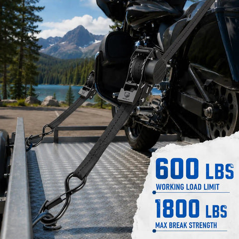 Tough As Nails Retractable Ratchet Straps 4 Pack Heavy Duty tie down cords securing a motorcycle on a trailer.