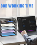 5 Tray Letter Paper Organizer With Handle Mesh Desk File Sorter beside a laptop on a desk in office setting.