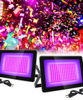 2 Pack 100W UV Flood Lights Blacklight For Outdoor Use IP66 Waterproof Stage Lighting 395nm 405nm Glow Party UV Glue Resin Curing With UL Plug And 3.3 Foot Cable High Intensity Long Life shown at a glow party.