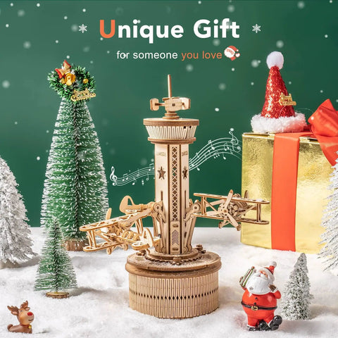 10 Inch 3D Wooden Puzzle Airplane Tower Music Box DIY Mechanical Model Kit For Adults Windup Rotating Tower That Plays Its A Small World on snow display