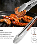 Heavy Duty Rosewood BBQ Tools Set For Grilling, Outdoor Grill Kit With Spatula, Fork, Brush And Tongs shown with food on grill