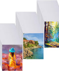 100 Pcs Sublimation Blanks For Picture Frames Eight Point Five By Eleven Inch Double Sided Canvas Sheets Heat Transfer For Inkjet Printing DIYers Art Projects Photos Murals Backdrops in three stacks with vibrant artwork displayed.