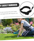 Woman using Eight Pack Lawn Aerator Sandals With Spike Straps For Grass And Soil Garden Shoes kneeling on lawn with strap close-up