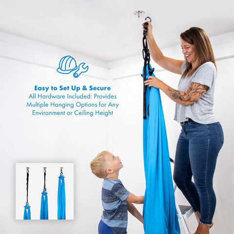 Woman setting up sensory swing for kids and adults that feels like a big hug, indoor and outdoor safe, holds up to 300lbs